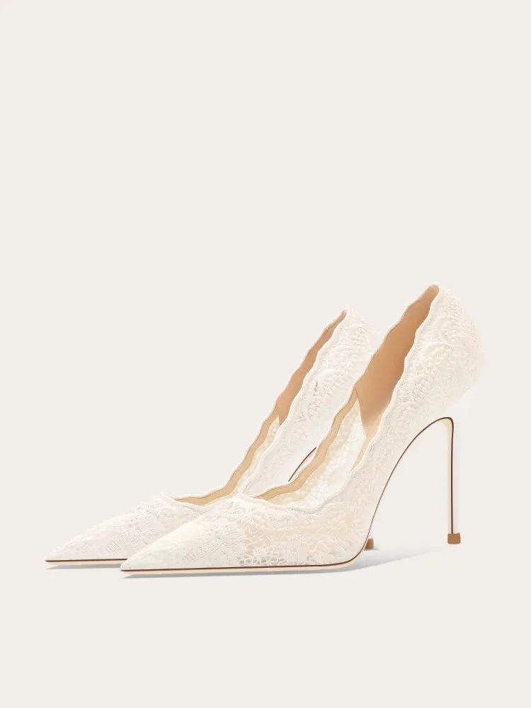 A full-length shot of women's wedding shoes, styled with a formal outfit.