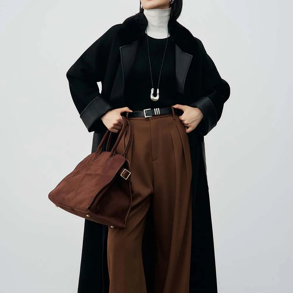 Women’s winter coat with belt and patchwork accents