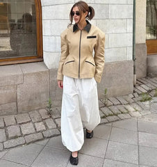 Turn-down collar jacket with contrast accents and clean tailored lines