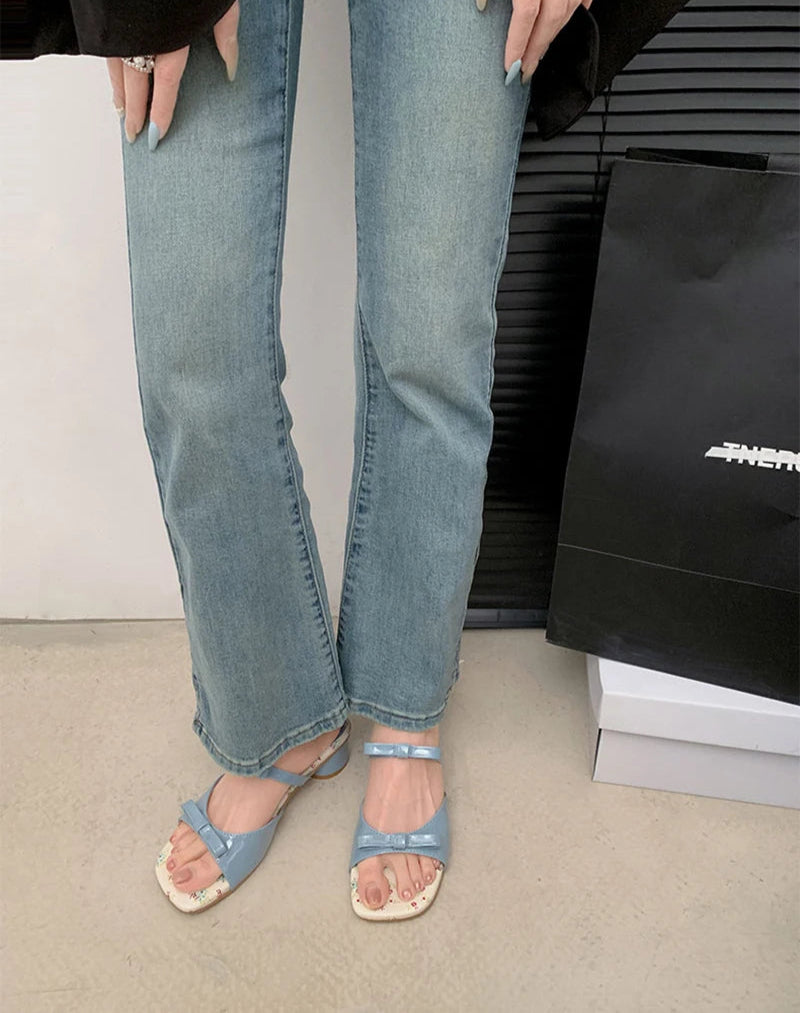 Women’s blue party sandals with bow detail