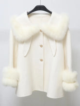 Wool short coat with faux-fur collar and cuffs on hanger