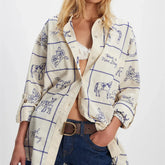 Y2K blue sketch print shirt styled for art-inspired summer looks