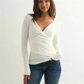 Y2K-inspired white wrap shirt with slim fit and modern neckline