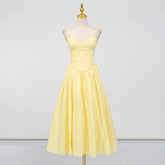 Yellow corset sleeveless party dress styled for summer events