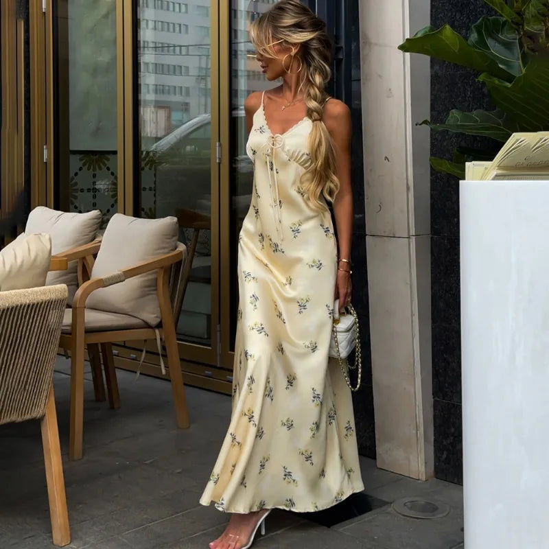 Yellow floral satin slip dress styled for French summer outings