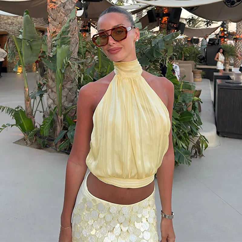 Halter tank top with gathered neckline and open back detail