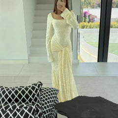 Yellow jacquard wrap maxi dress with lace-up waist styled for autumn events