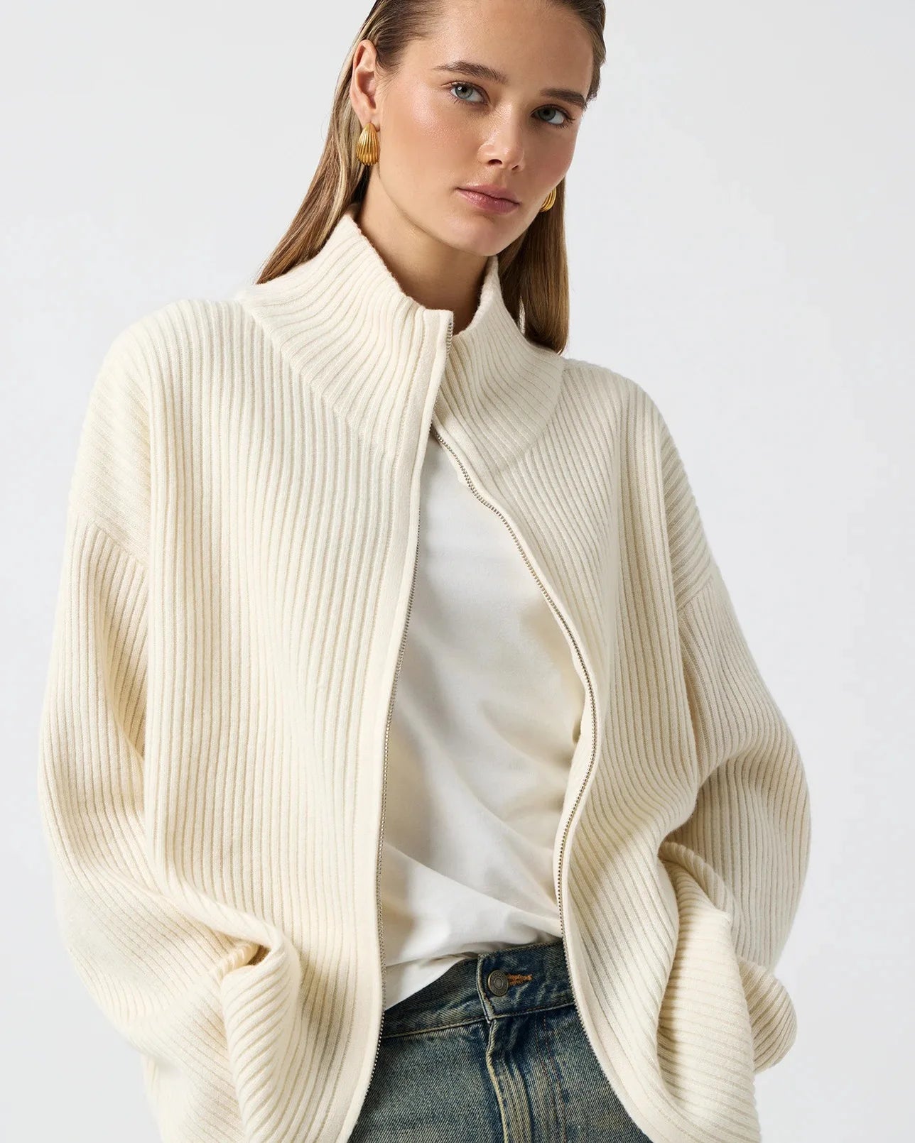 Zip closure cream ribbed sweater with high neck for casual winter warmth