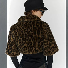 Close view of fluffy leopard pattern on a cropped zip jacket