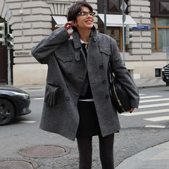 Black spliced jacket with zipper detail for modern high street look