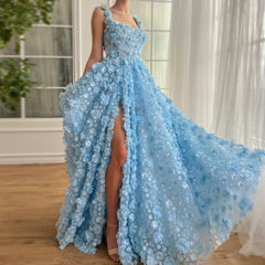A woman wearing a lilac evening gown with 3D embroidered flowers and a high slit.