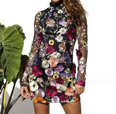 Woman wearing 3D floral embroidered mesh mini dress