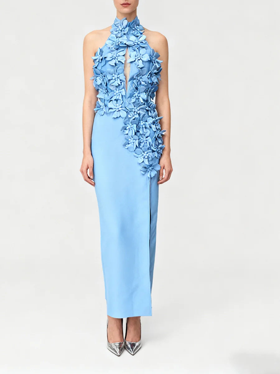 Model wearing a stand-neck evening dress with three-dimensional floral detailing