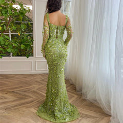 A close-up shot of the intricate floral appliqués and beading on the tulle fabric.
