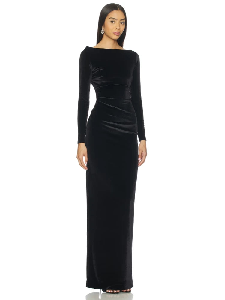 Front view of a black velvet gown with long sleeves