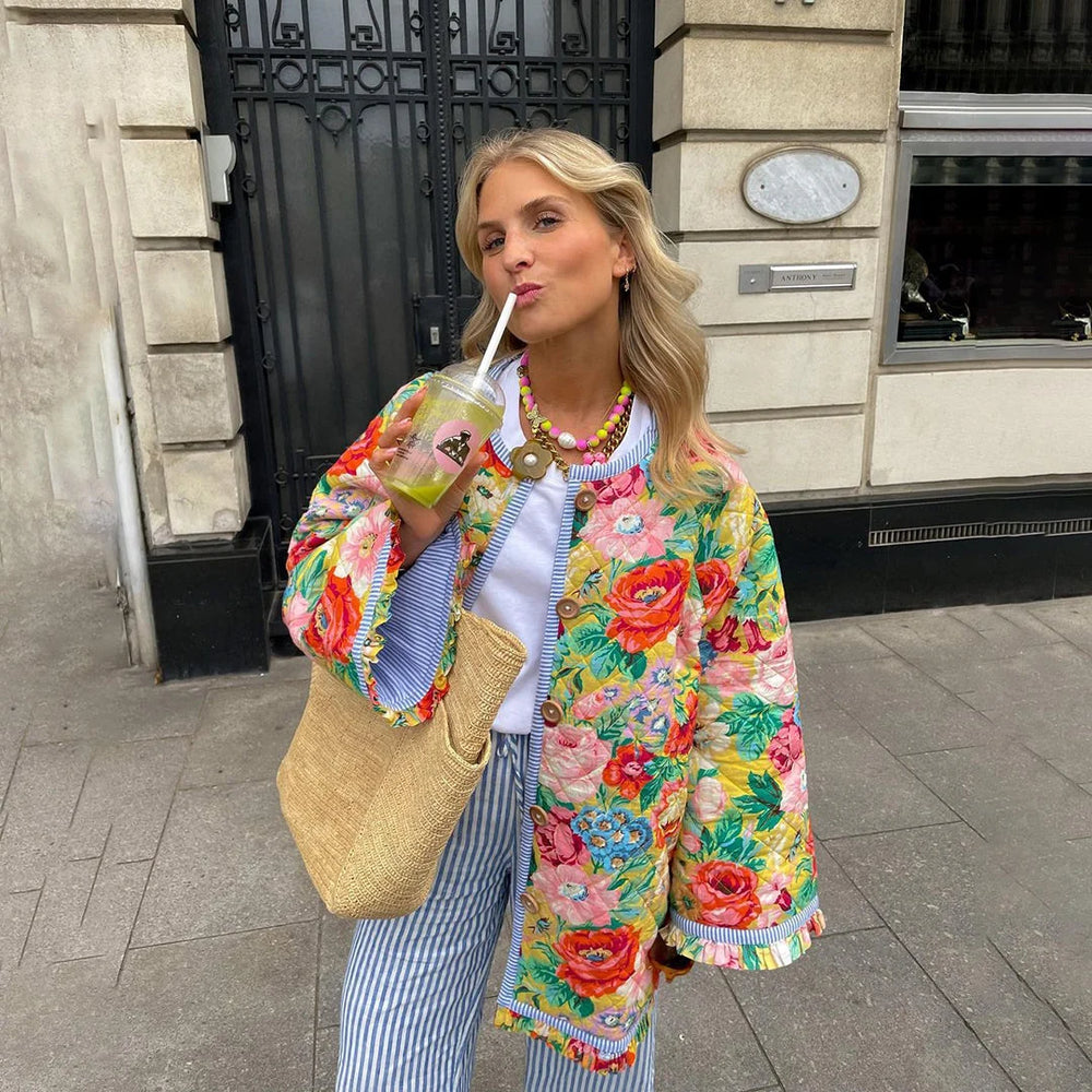 Floral print quilted jacket with button front and long sleeves