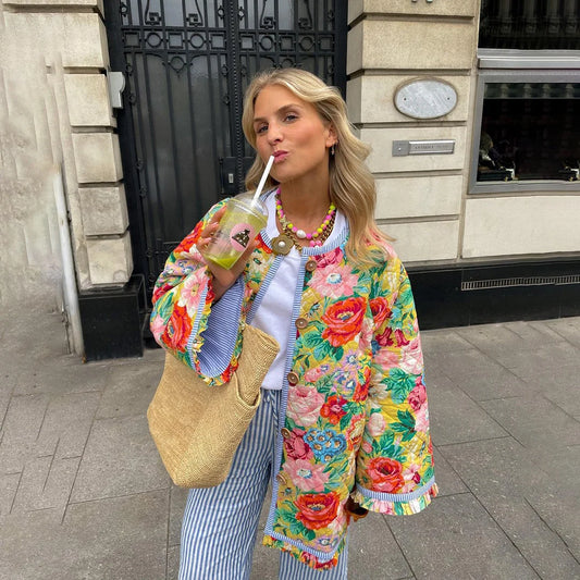 Floral print quilted jacket with button front and long sleeves