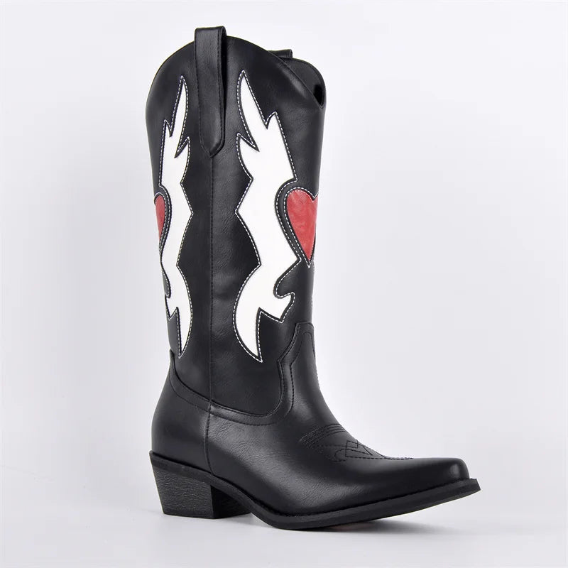 Side view of black embroidered heart western boots