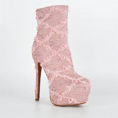Pink lace boot with a high heel on a white background