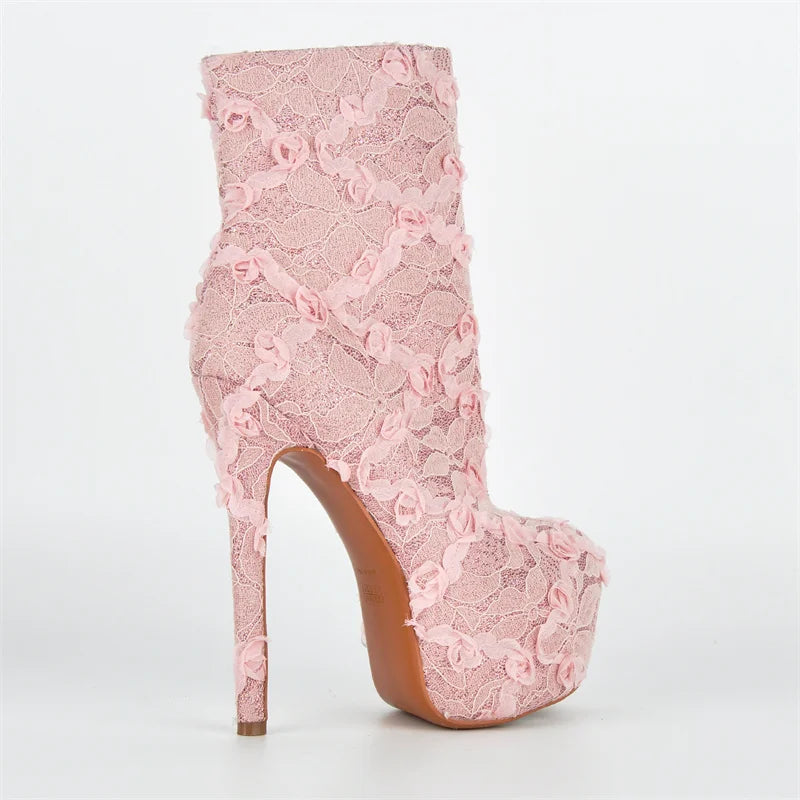 Pink lace high-heeled boot on a white background