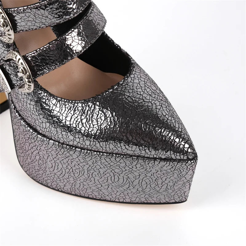 Silver crinkled high-heeled shoe on a white background