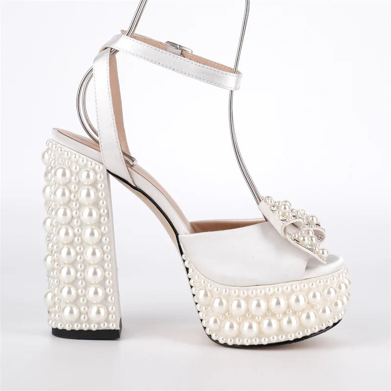Side view of pearl embellished platform block heel sandals