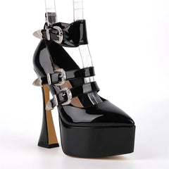 Black platform high-heeled shoes with buckles on a white background