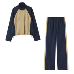 Flat lay of colorblock jacket and trousers set