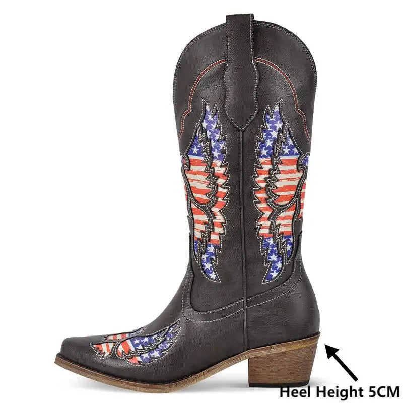 Heel height detail on black embroidered wing western boots