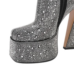Close-up of platform detail on black rhinestone chunky ankle boots
