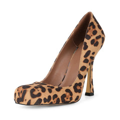 Leopard print high-heeled shoe on a white background