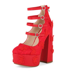 Red high-heeled shoe with butterfly designs on a white background