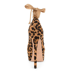 Leopard print high-heeled shoe with a beige bow on a white background