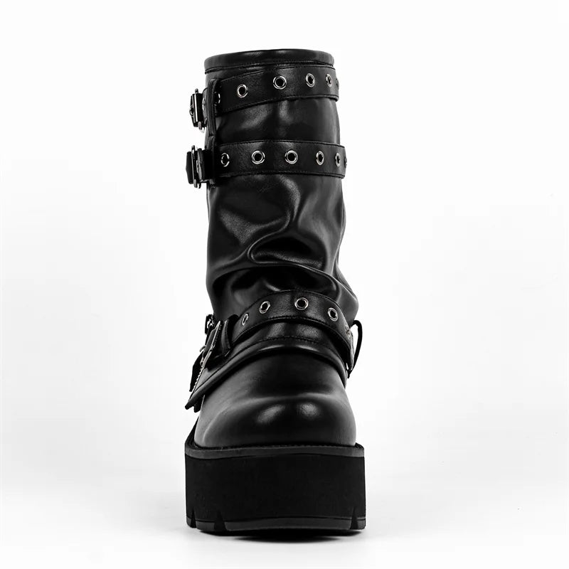 Front view of black faux leather platform ankle boots with multiple buckles.