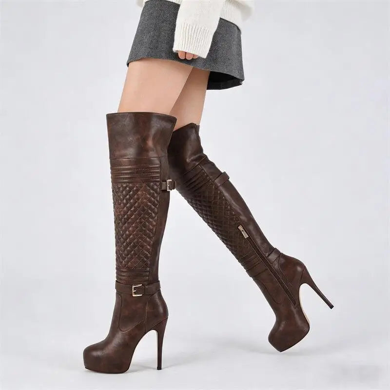 Close-up of the quilted texture on over the knee high heel boots.