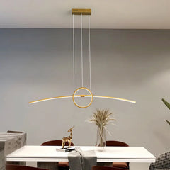 Golden Atelier LED pendant lamp with a modern design, hanging from a ceiling and casting a warm glow. Text overlay indicates voice control compatibility with Alexa. 2