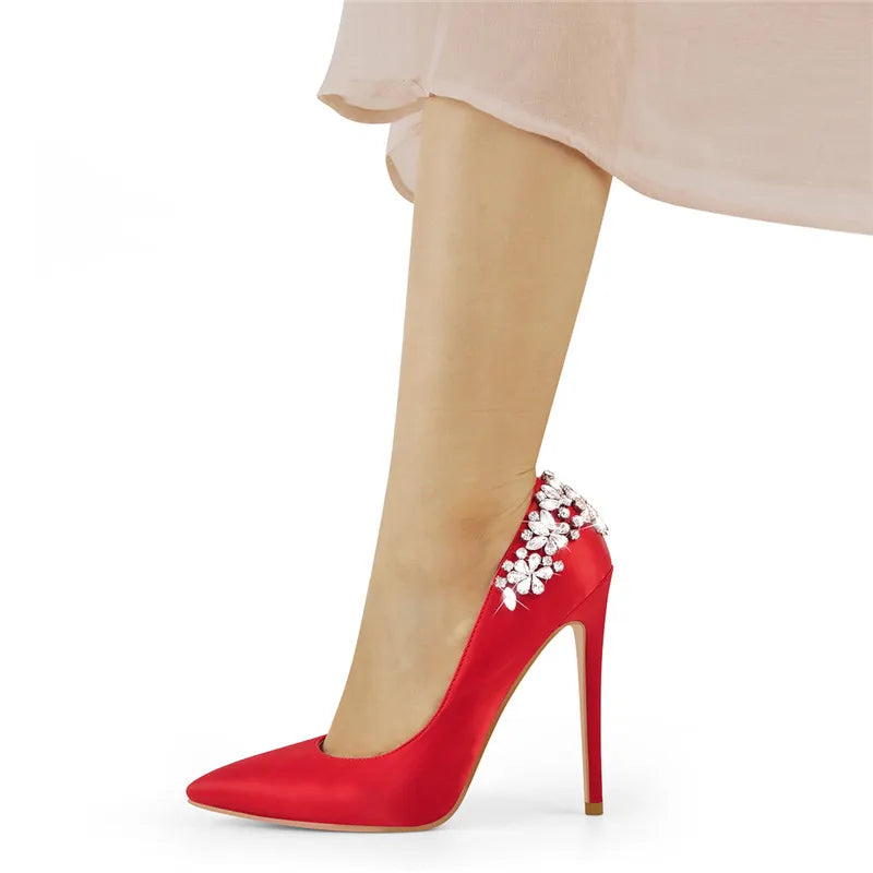 Red satin pointed toe stiletto heel with crystal embellishments on the heel counter.