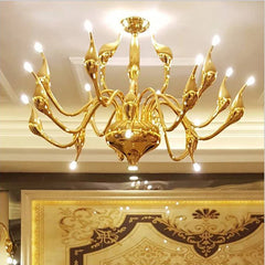 Close-up detail of the G4 LED bulbs and crystal pendants on the swan chandelier, showcasing the intricate design. Gold color .Golden Atelier 2