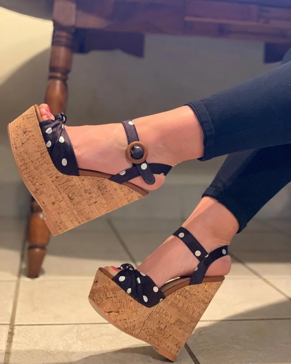 Side view of polka dot platform wedge sandals
