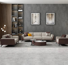  Golden Atelier sectional sofa in a beige fabric with a modular design, allowing for different configurations in a living room setting. Text overlay highlights the ability to customize the color. 5 Seater With Table