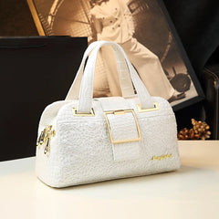  Close-up of a stylish crocodile pattern Boston bag showcasing its 3-layer design and spacious interior. White 4