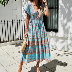 Tiered midi dress with V-neck and short butterfly sleeves