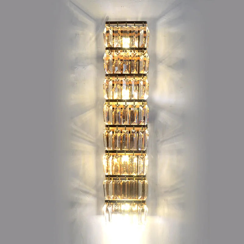 Modern crystal wall sconce with gold-plated stainless steel vertical frame, sparkling light
