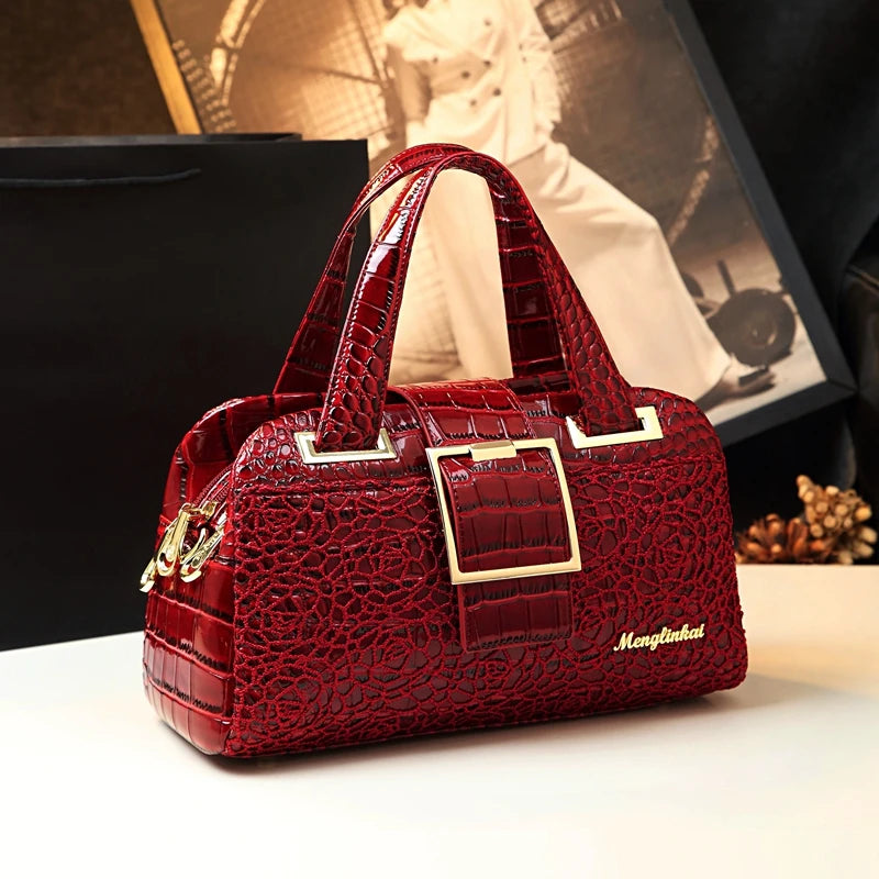  Close-up of a stylish crocodile pattern Boston bag showcasing its 3-layer design and spacious interior. 1 Red