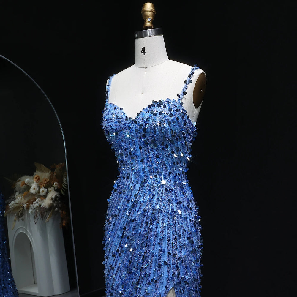 Blue sequin dress on a mannequin against a black background