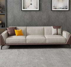  Golden Atelier sectional sofa in a beige fabric with a modular design, allowing for different configurations in a living room setting. Text overlay highlights the ability to customize the color. 3 Seater