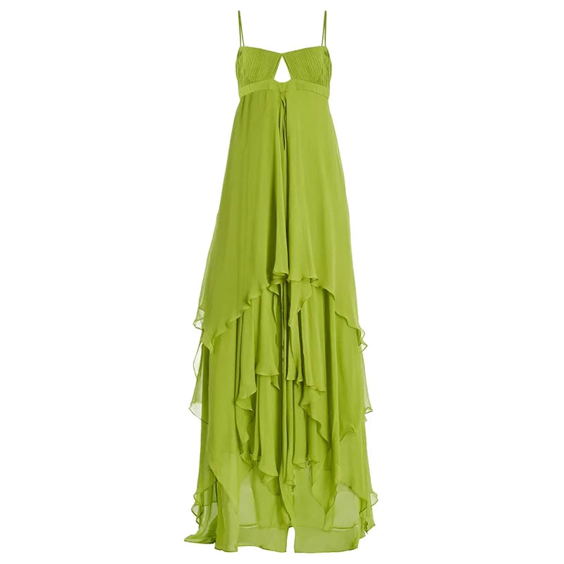 Green dress with layered skirt on a white background