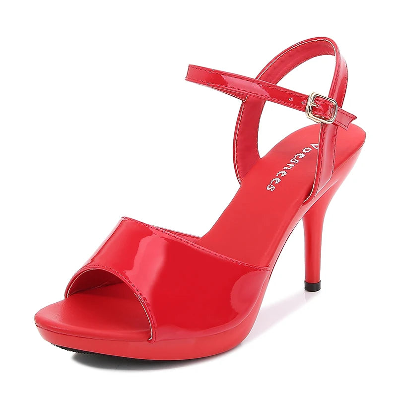 Red high-heeled sandal on a white background
