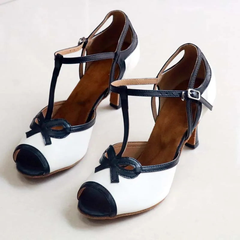Peep toe T-strap dance heels with black trim and bow