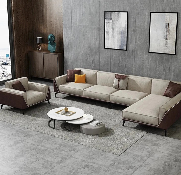  Golden Atelier sectional sofa in a beige fabric with a modular design, allowing for different configurations in a living room setting. Text overlay highlights the ability to customize the color. 6 Seater